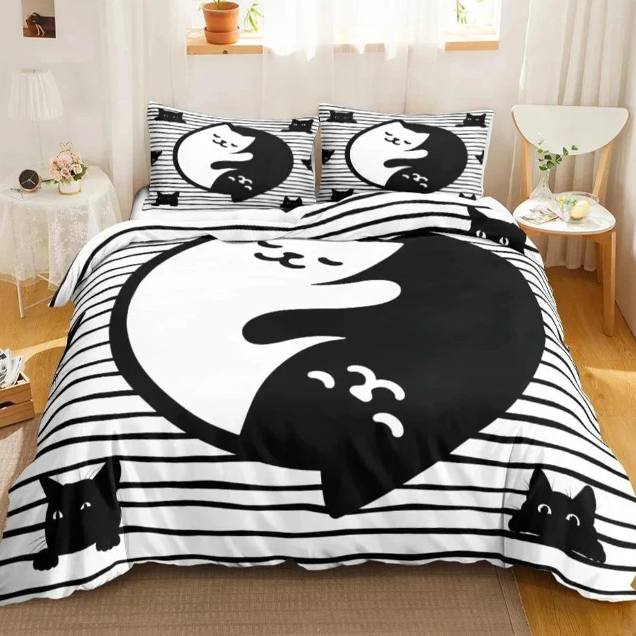 Bedding set features a bold black and white design with stylized yin-yang cats and striped patterns, perfect for a modern and minimalist decor style.