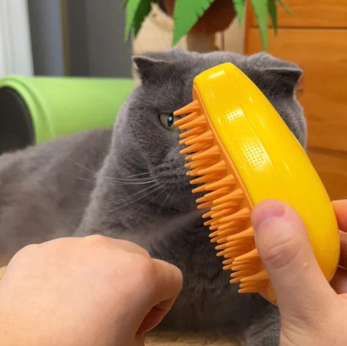 Cat enjoying a relaxing grooming session with the Steamy Cat Brush