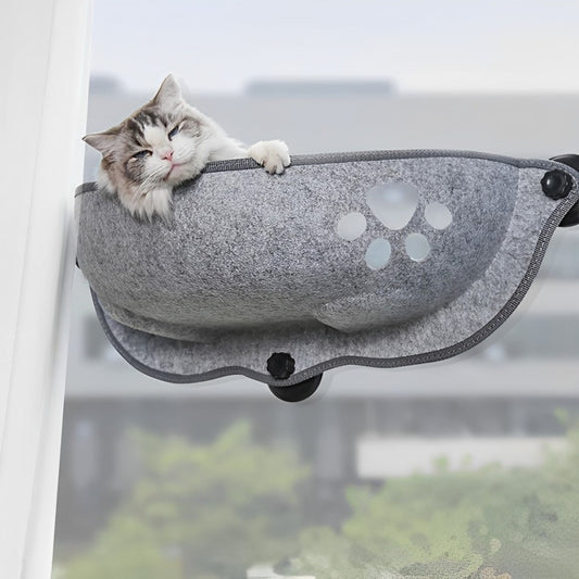 Cat relaxing on a cozy window perch hammock with soft plush cushion