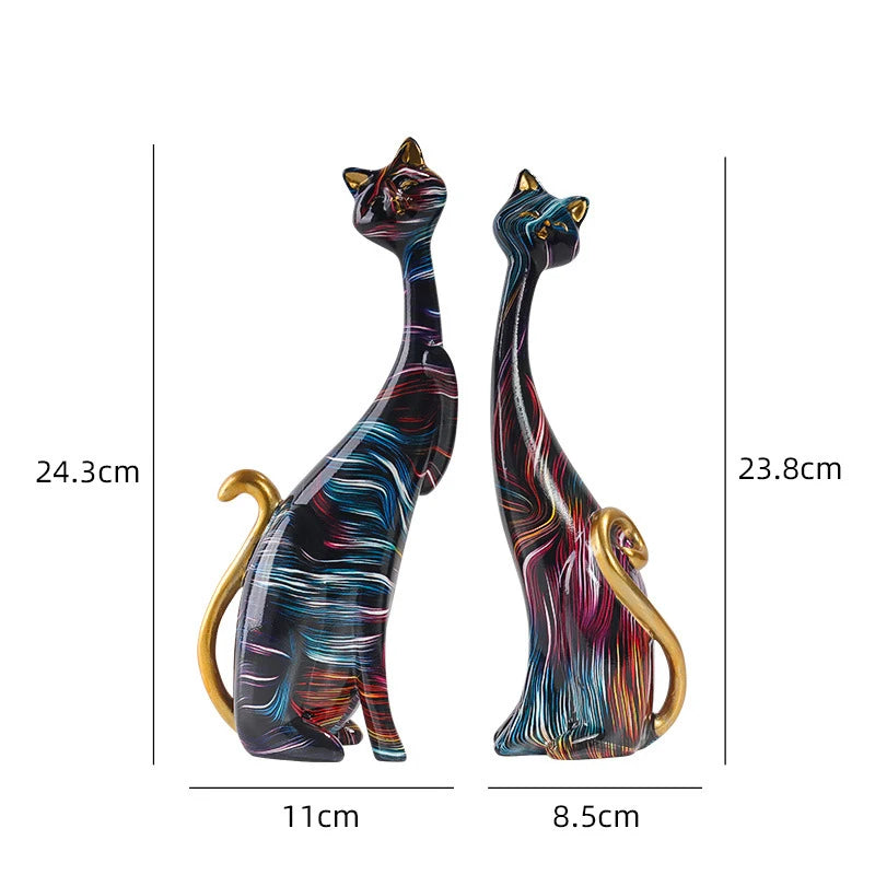 Modern art inspired cat statues in vivid colors, showcasing unique craftsmanship.