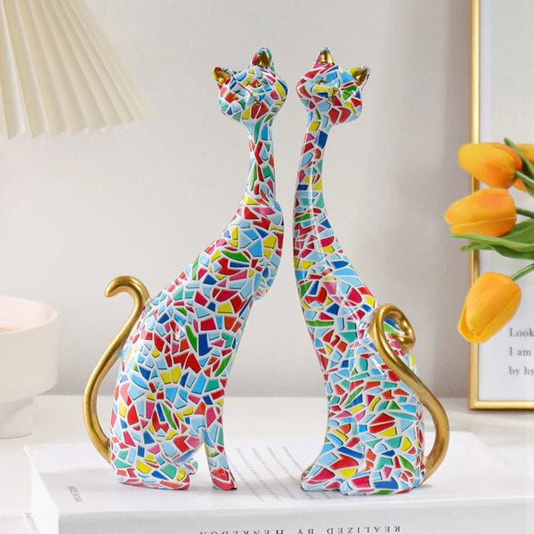 Colorful resin cat sculpture with abstract graffiti pattern in a Nordic style